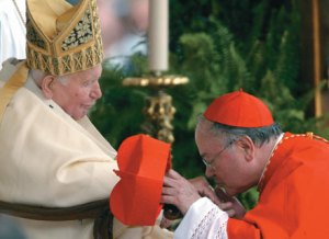 A cardinal and his pope