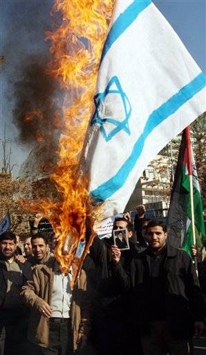 41f88087-085c-4cbb-9c32-4c2091f4af49.widec Burning the Isreali flag, and supporting Islamic regimes that wants to destroy Israel.