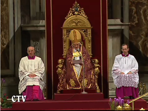 The present Pope sits in the Papal throne in Rome. 