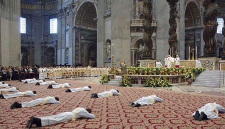 Papal bishops worshiping the man in the Papal throne in Rome