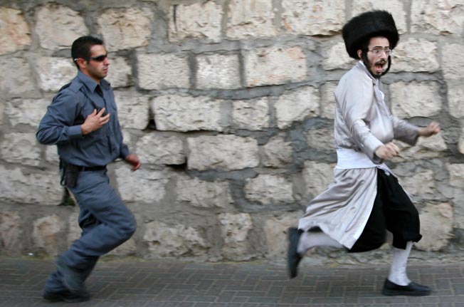 Jews tighting with Jewish police men is a display of disunity the enemies of Israel will use for all its worth. 