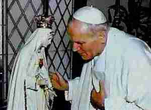 The Pope praying to an idol of stone and wood