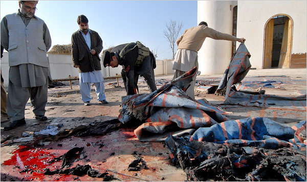 NYT2007122108515875C.600 Only God knows what they are searching for. Muslims killings Muslims with human bombs.