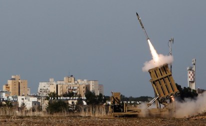 An Iron Dome launcher fires an interceptor rocket in the southern city of Ashdod