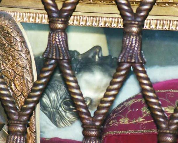 The skull of Pope Pius X has been covered with a face mask.