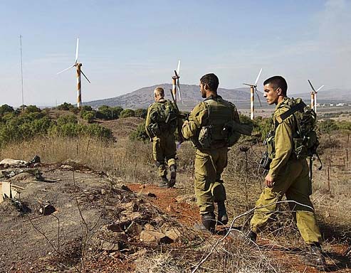 Israeli army on patrol on the Golan secures peace in the Galilee. 