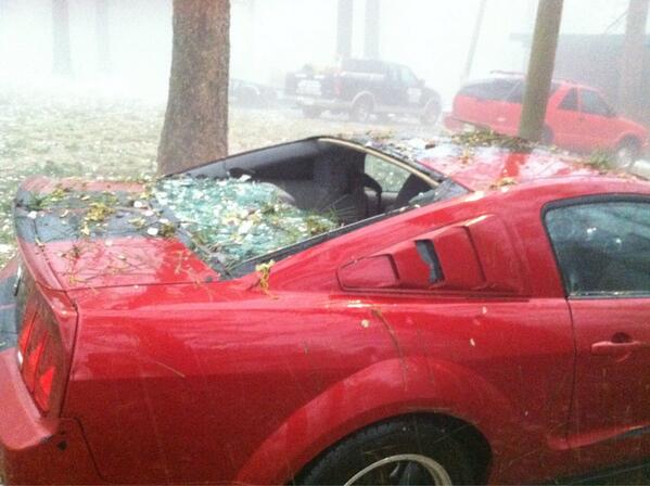 This car was hit by hails that was larger than golf balls. Some even bigger than that. 