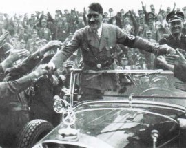 Anschluss: Hitler was greeted as an Holy Roman emperor in Austria on 12 March 1938.