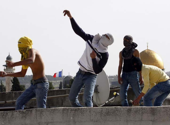 Muslims practice their "peaceful" religion the Temple Mount in Jerusalem.
