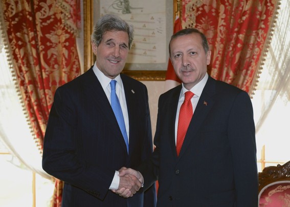 John Kerry at least managed to get up in time to shake hands with the PM of Turkey.