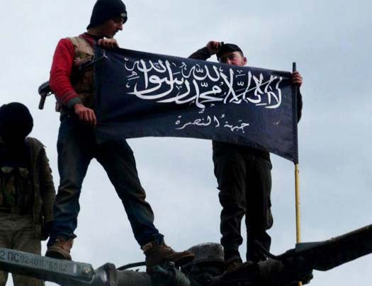 A flag supported by Washington is hoisted inside Syria. 