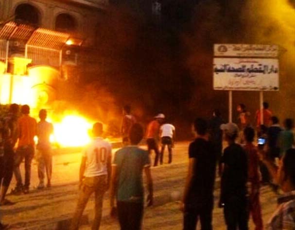 The Islamic riot Police let "demonstrators" put the Muslim Brotherhoods office on fire. 