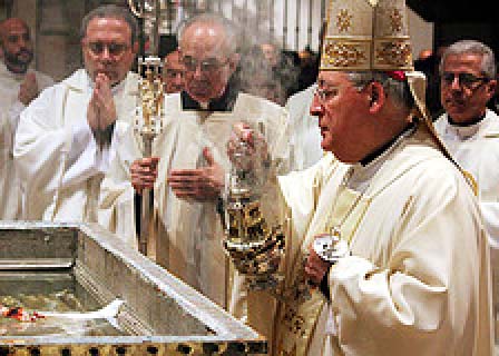 The local Bishop offer incense to the skull, worshiping the dead. 