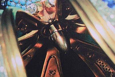 A bullet it attached to the crown of the "Lady of Fatima"