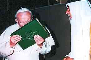 The late Pope John Paul II kiss the "Holy Koran". 