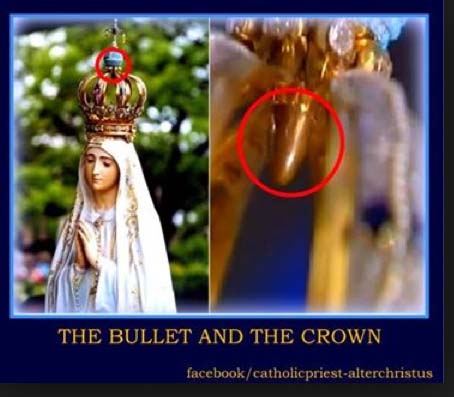 Catholics seems no problem by honoring this wooden statue, even with a waste from a fire arm.