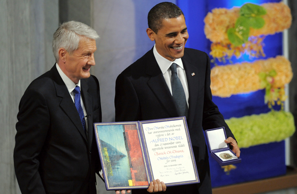 Norwegian socialist leader Thorbjørn Jagland gives Obama the Nobel peace price.