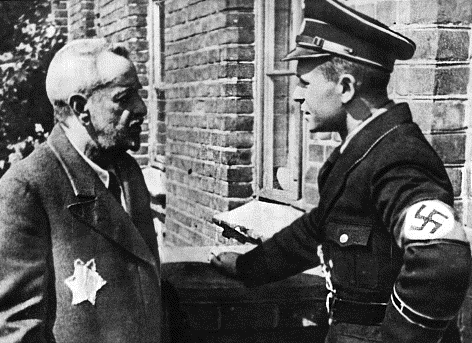 The Nazis forced the Jews to wear yellow badges on their jackets. 