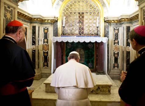 Pope Francis, flanked by Cardinal Angelo Comastri, left, and Bishop Vittorio Lanzani, right, kneels in prayer in front of what is believed to be the burial site of St. Peter's Read more: http://www.ctvnews.ca/world/pope-francis-takes-emotional-up-close-visit-to-tomb-of-st-peter-1.1218700#ixzz2kMr4af65 