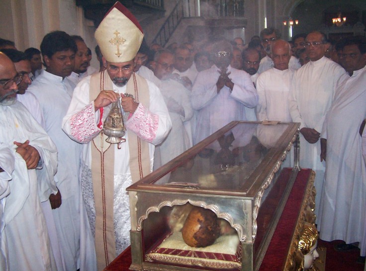 Bishop Filipe Neri Ferrão of Goa mock the Bible by his worship of the dead.