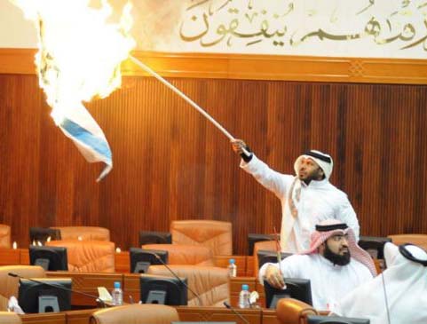 Nov. 20, 2012 MP's in Bahraini burns the Israeli flag. 