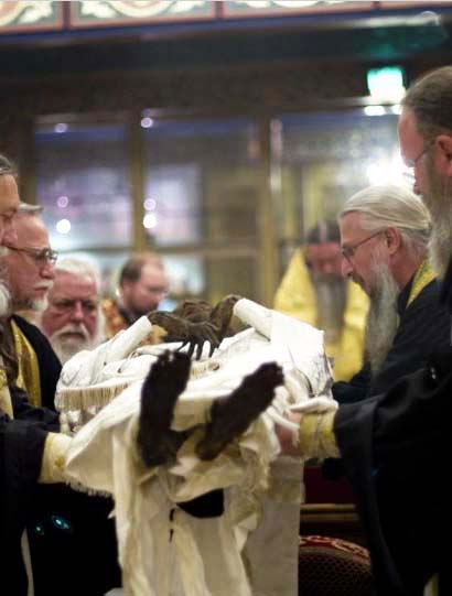 Orthodox clergy in America, in the prosess of dressing up a corpse