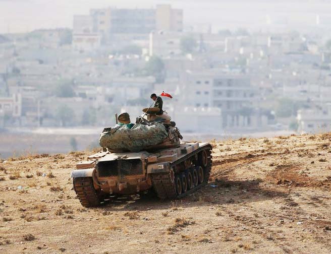 NATO forces in Tyrkia overlooks the slaughter of Kurds done by ISIL. 