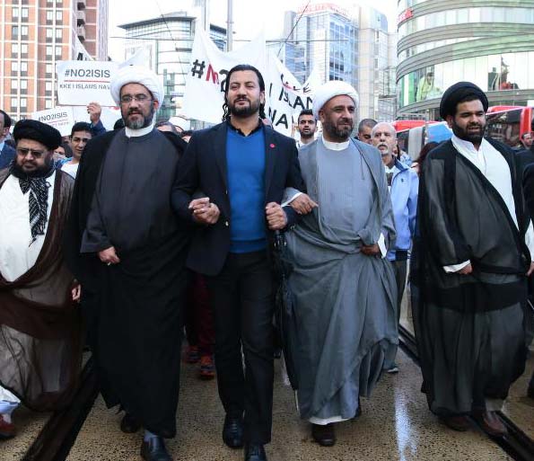 Supporters of the Islamic revolution of Iran protest against the Islamic state as they march through Oslo. 