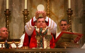Cardinal Burke worshiping the pagan sun "god" in the name of Christ. 