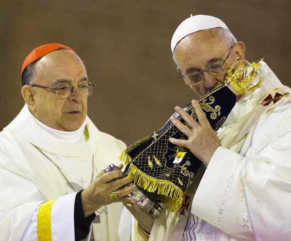 The Pope kiss the statue of the Queen of Heaven, call her "Mary" and declear her a sinless goddess.
