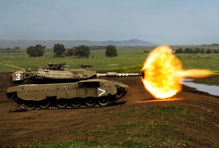 An Israeli tank fires towards Syria, in a military drill on the Golan in 2008. 