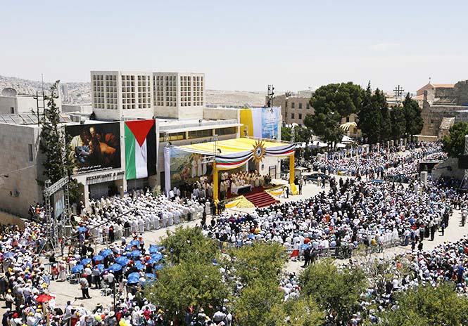 both the Vatican and Palestinian flag are hoisted as 