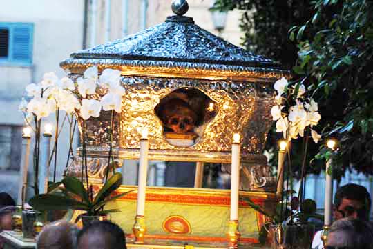 The skull is paraded through the street, and no one objects to this spiritual insanity.