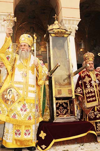 The Orthodox priests carry their 